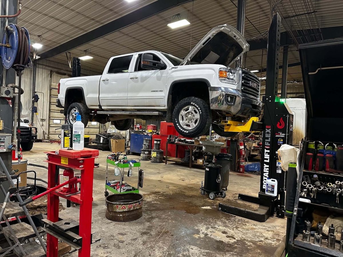 Pickup truck on the lift in the shop